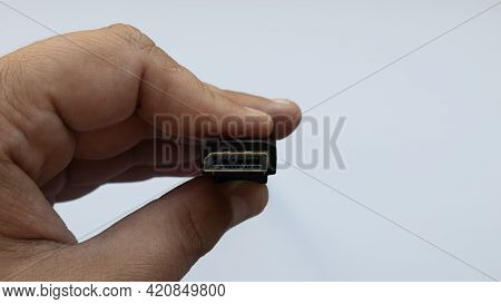Hdmi Cable In Hand On White Background