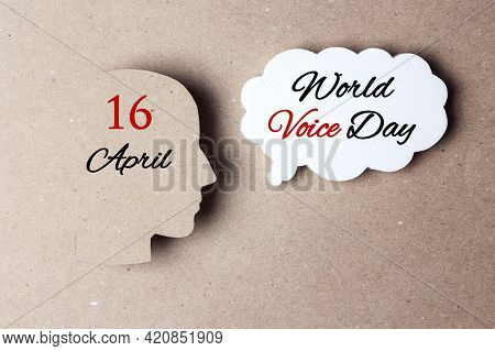World Voice Day, 16 April. Greeting Card With Head Silhouette And Speech Bubble On Brown Paper Backg