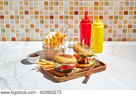 Delicious Homemade Burgers On Wooden Tray In Bright Sunlight. Burgers With Veal Cutlet, Pamidor, Che