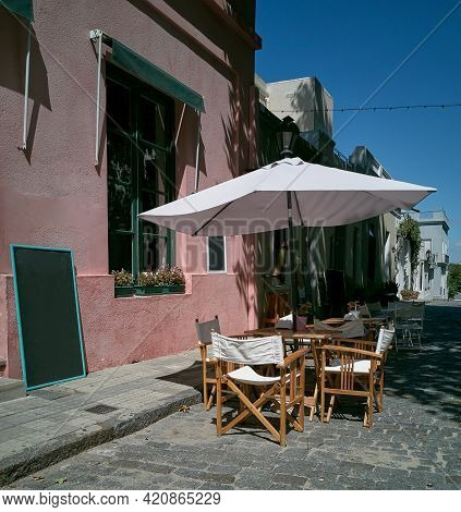 Empty Table In An Outdoor Restaurant In The Old Town In Colonia Uruguay