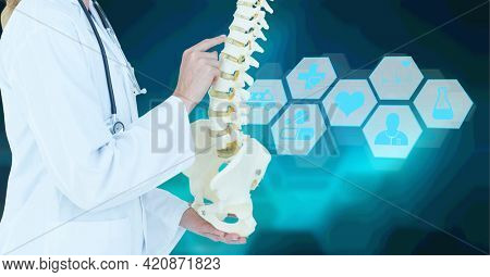Composition of caucasian female doctor over digital interface with medical icons. global medicine and digital interface concept digitally generated image.