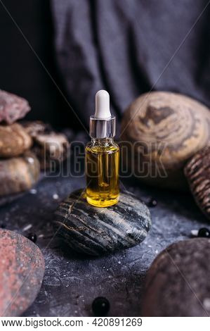 Small Glass Bottle With Natural Magic Oil. Cosmetic And Magic Elixir.