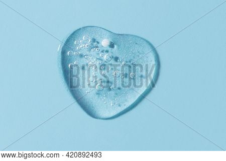 Cosmetics Gel Smear Looks Like Heart.clean Blue Background With Copy Space.good As Cosmetic Mockup.t