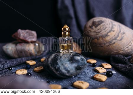 Small Glass Bottle With Natural Magic Oil. Cosmetic And Magic Elixir.