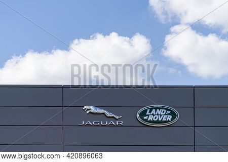 Jaguar Land Rover Brand Logo Sign Near Oficial Dealer Office Showroom Building Located In Vilnius, L