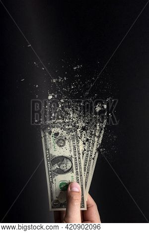 Spend Money, Spend All Your Money Illiterately. The Dollar Bill Turns To Ash, Dissolves Against A Bl