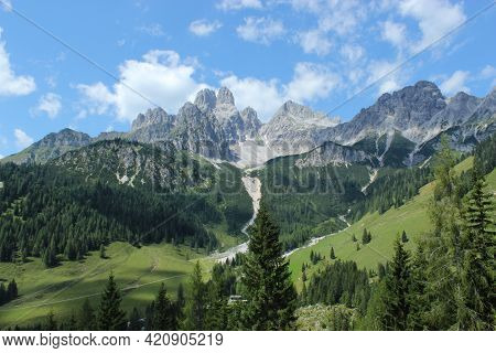 View Of The Vast Valley And Mountain Peaks Of The Austrian Alps.