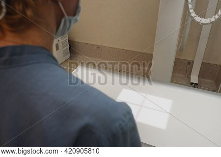 The Work Of A Radiologist In The X-ray Room For Diagnostics.