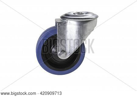 A Small Road Wheel From A Metal Trolley. Accessories Used For Transport In The Store And Factory.