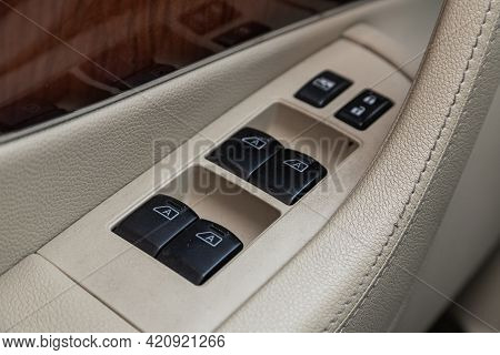 Novosibirsk, Russia - May 16, 2021: Infiniti Qx, Car Door Interior Armrest With Window Control Panel