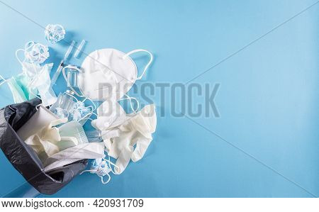 Covid-19 Plastic Waste And Garbage, Disposable Masks, Medicl Glove, Alcohol Gel Bottle And Needle In