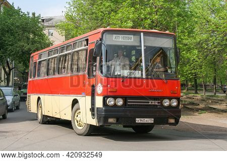 Ufa, Russia - May 22, 2008: Red Interurban Coach Bus Ikarus 256 In The City Street.