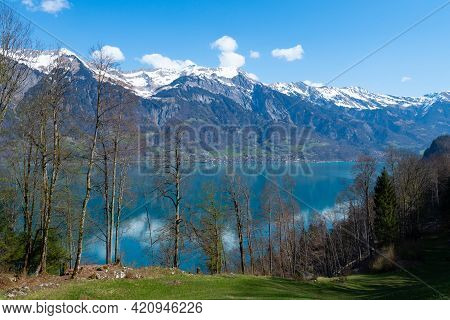 Beautiful View Over Lake Brienzersee And Snow Covered Mountains