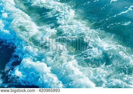 Areal Shot Of Deep Blue And Rough Sea With Lot Of Sea Spray.blue Background.soft Focus,blurred Image