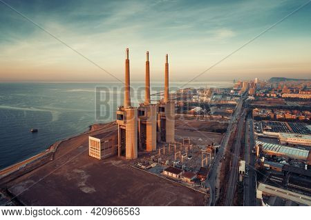 Besos thermic power plant aerial view at sunrise in Barcelona coast Spain.