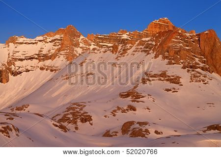 Sunrise In Snowy Mountains