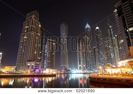 The Night Illumination At Dubai Marina And Cayan Tower, Dubai, Uae