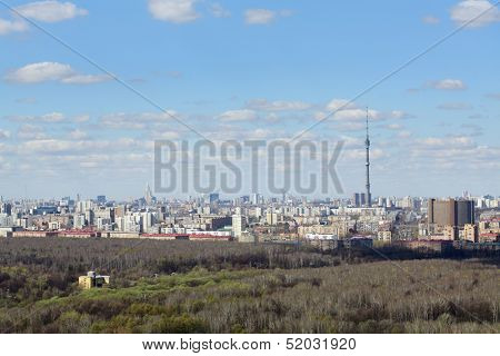 Losinoostrovsky forest park and Ostankino TV Tower at day in Moscow, Russia.