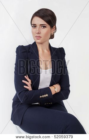 Beautiful business girl in black suit