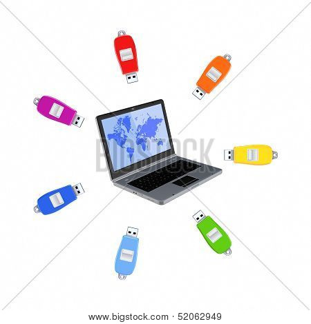 Colorful flashdrives around notebook.