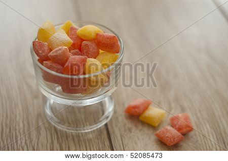 Orange And Lemon Bon Bons In A Glass Bowl