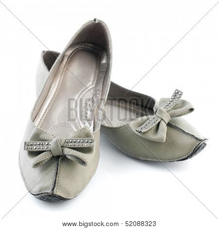 Pair of female casual flat shoes on white background