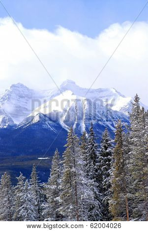 Snowy mountain ridges at Lake Louise in Canadian Rocky mountains