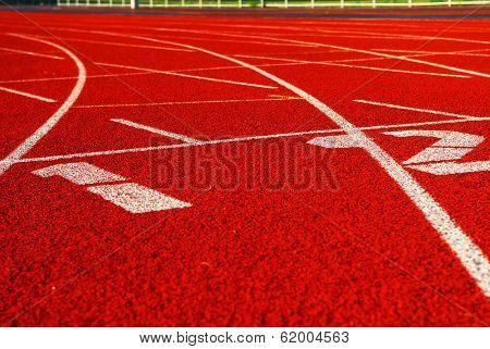 Curving lanes of a red racetrack with numbers