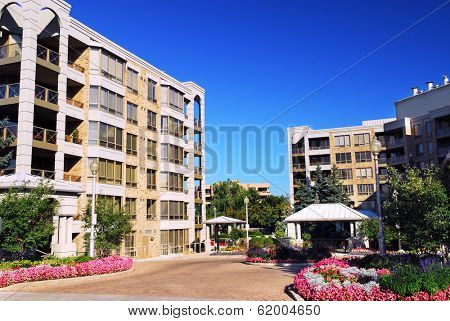 View of modern upscale condominium buildings with landscaping