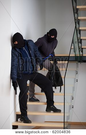 Two Criminals On Stairs