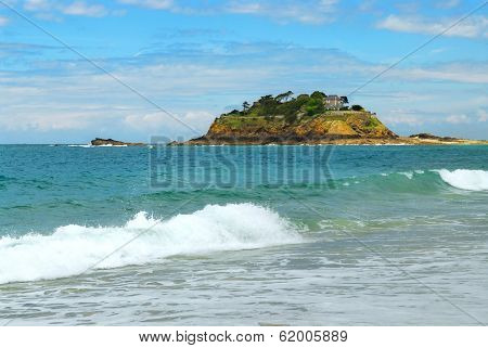 Rocky island off the ocean shore in Brittany, France