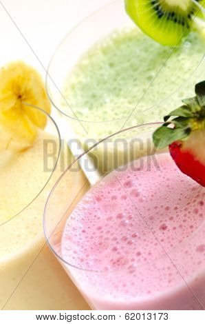 Assorted fruit and berry smoothies close up