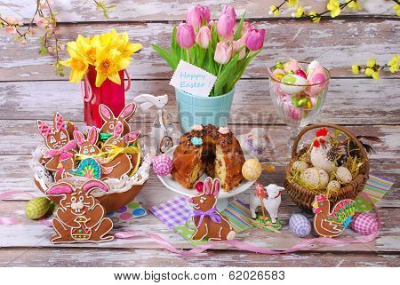 Easter Table Decoration With Gingerbread Cookies And Ring Cake