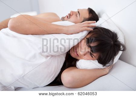 Yound Woman And Her Snoring Boyfriend