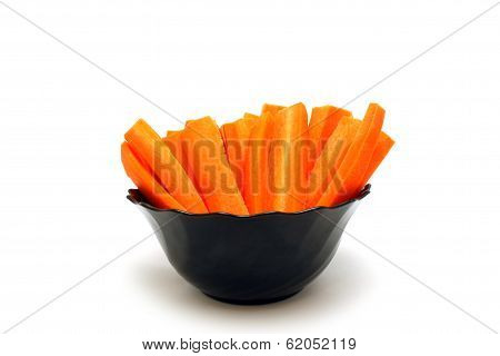 Long Carrot Slices Into A Bowl