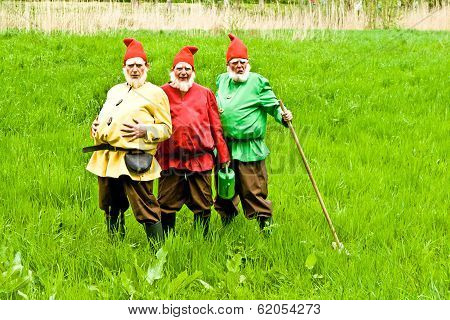 Three Garden Gnomes Enjoy Children At The Festival For Inauguration The New Quellenpark