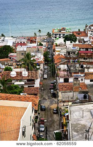 View of street leading to Pacific ocean in Puerto Vallarta, Mexico