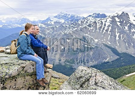 Father and daughter enjoying scenic Canadian Rocky Mountains view in Jasper National park