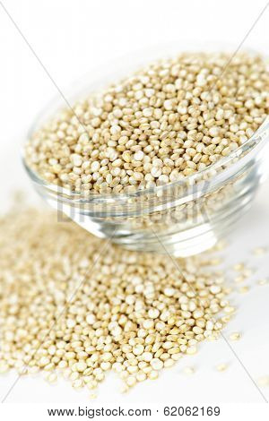 Quinoa grain in glass bowl on white background