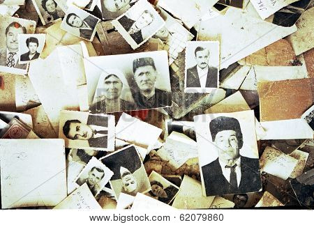 SARAJEVO, BOSNIA - AUG 16: Obituary photos litter the floor of Oslobodjenje, a local newspaper, after it was destroyed by artillery fire in Sarajevo, Bosnia, on Monday, August 16, 1993