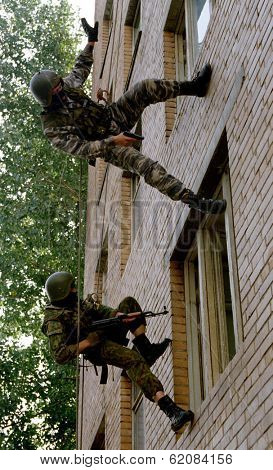 MOSCOW - AUGUST 6:  Russia's elite OMON special police force practice an assault at a training ground in Moscow, Russia, on Sunday,  August 6, 2000.