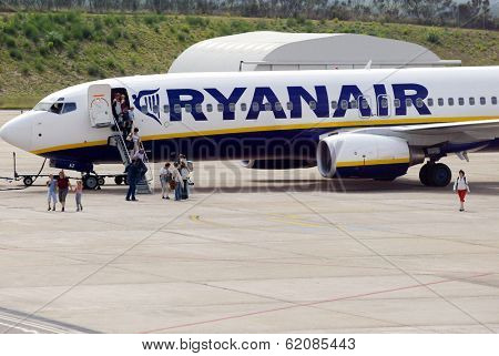 GERONA - OCTOBER 12: A Ryanair airplane arrive at the airport in Gerona, Spain on October 21, 2005.
