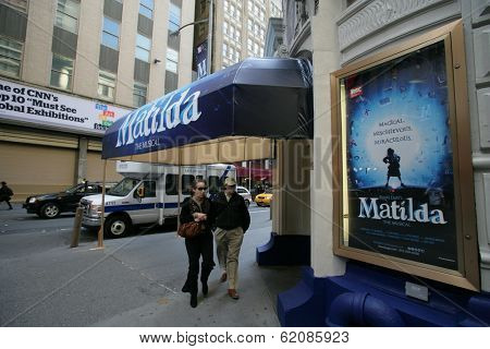 NEW YORK CITY - APRIL 19: People walk past the Shubert Theater featuring the Broadway play Matilda in New York City, on Friday, April 19, 2013.