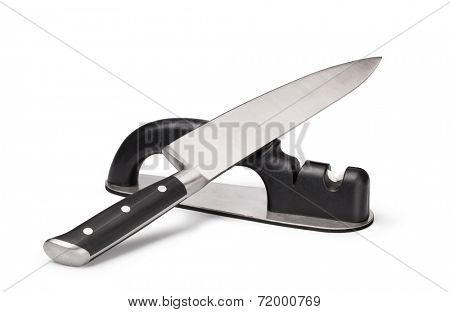 Grindstone and knife isolated on the white background