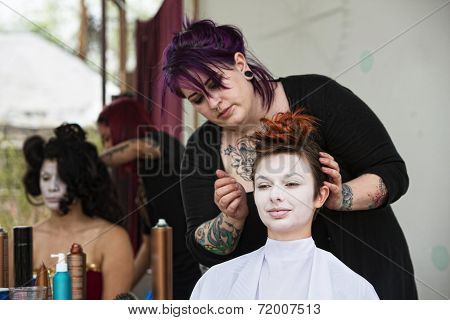 Stylist Fixing Hair
