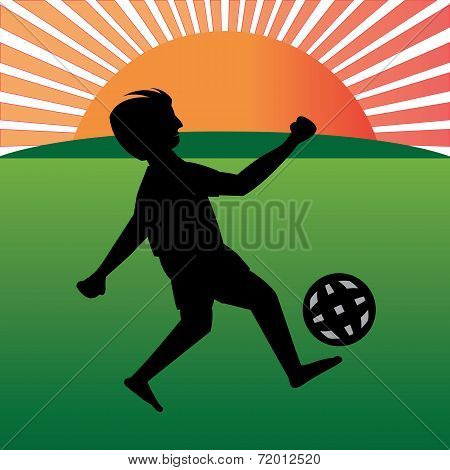 Boy Playing Football In Playfield
