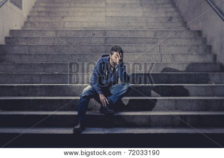 Young Man Lost In Depression Sitting On Ground Street Concrete Stairs