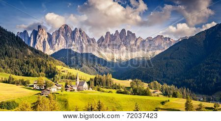 Countryside view of the St. Magdalena or Santa Maddalena in the National Park Puez Odle or Geisler summits. Dolomites, South Tyrol. Location Bolzano, Italy, Europe. Dramatic morning. Beauty world.