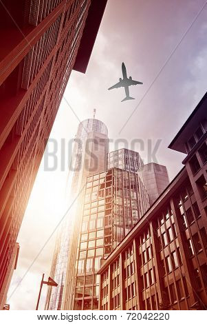 plane flying over office district of Frankfurt am Main, Germany