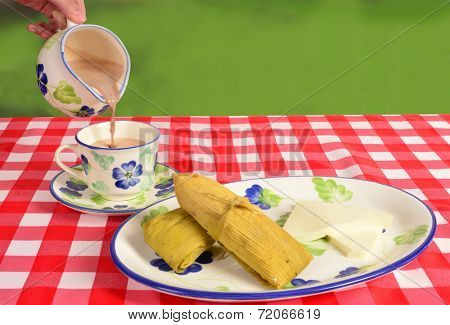 Hot chocolate with envueltos and cheese.